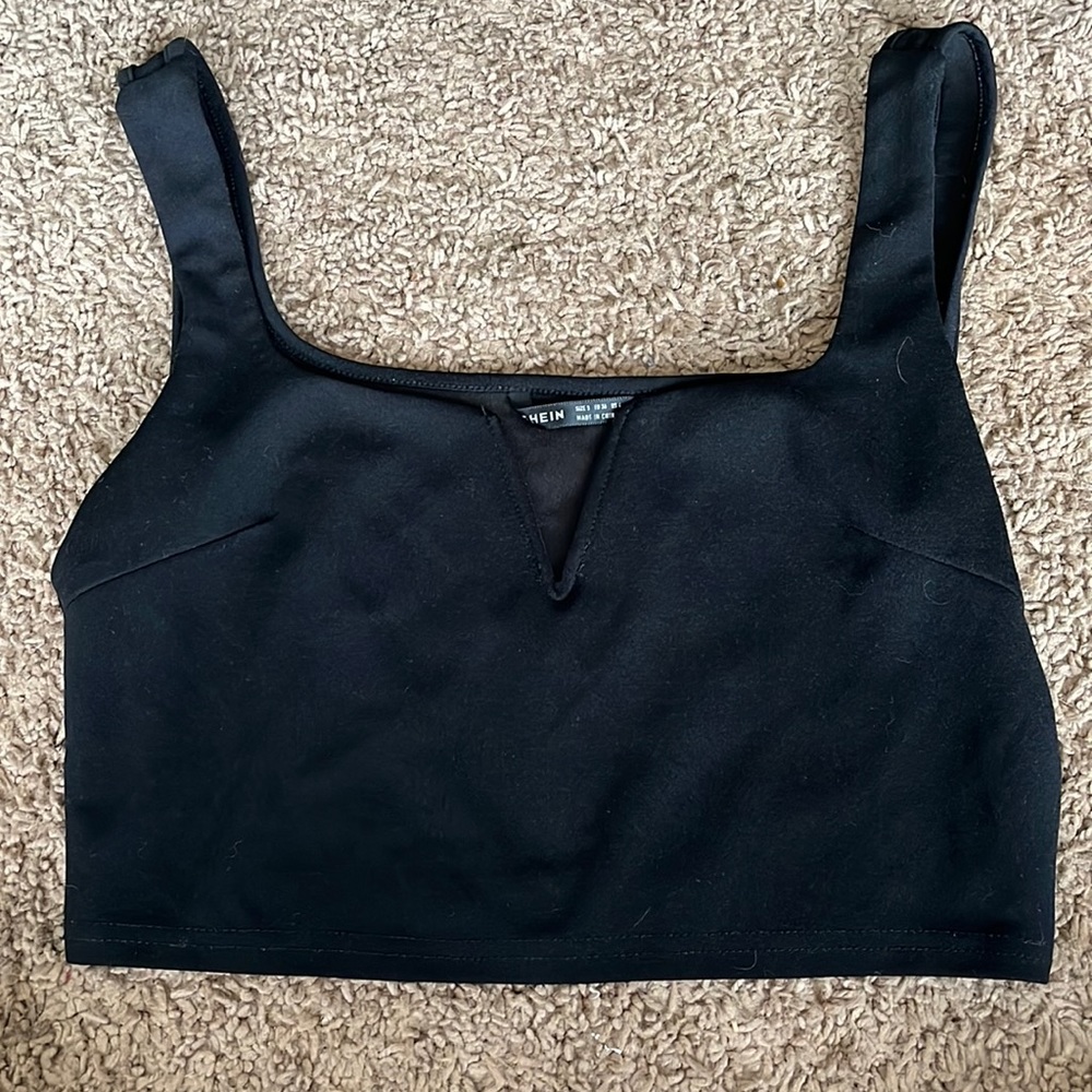 Im selling a black, stylish tank top from Shein!